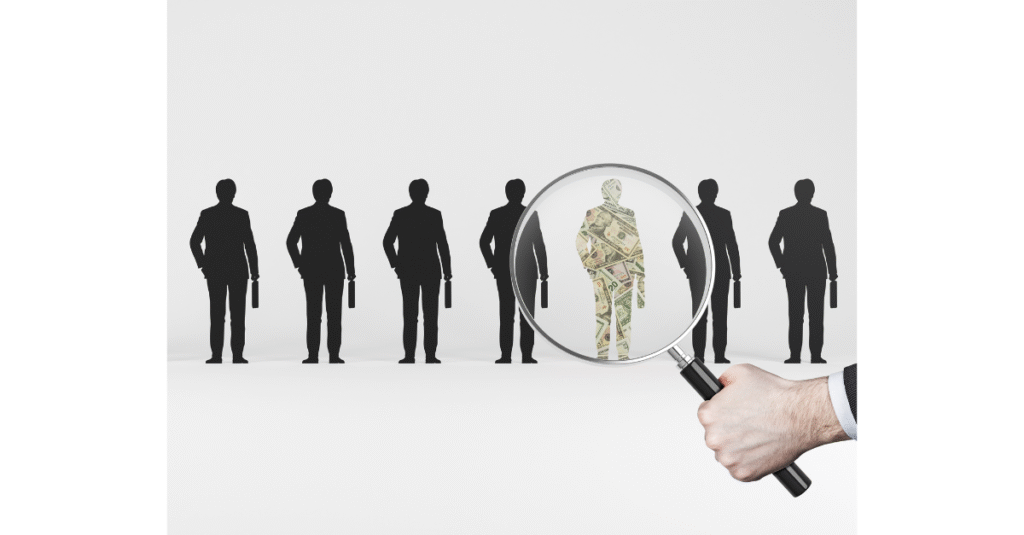 Magnifying glass highlighting a businessperson made of dollar bills among silhouettes, symbolizing succession planning and identifying value in leadership.