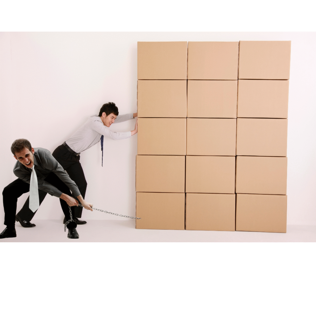 Two business professionals struggling against resistance, symbolizing the challenges of change and leadership transitions.